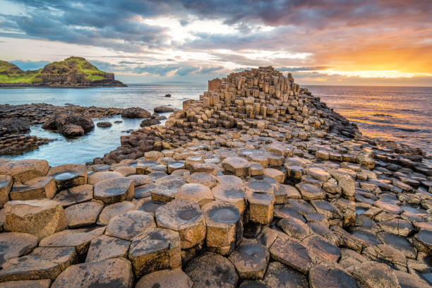 giants causeway Stock photograph of a dramatic sunset at the Giant's Causeway in Northern Ireland, UK.